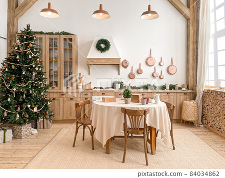 Festive christmas modern kitchen with big tree Festive christmas modern kitchen with big tree 84034862