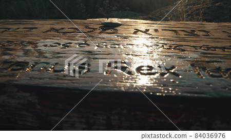 Wooden signboard on cross covered with blood Wooden signboard on cross covered with blood 84036976