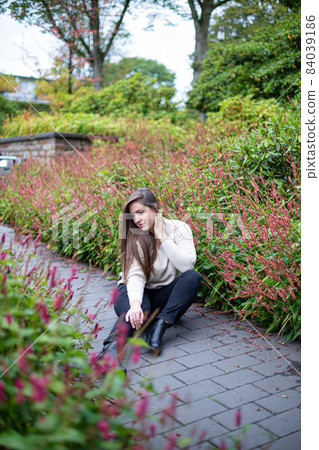 White young european woman in park 84039186