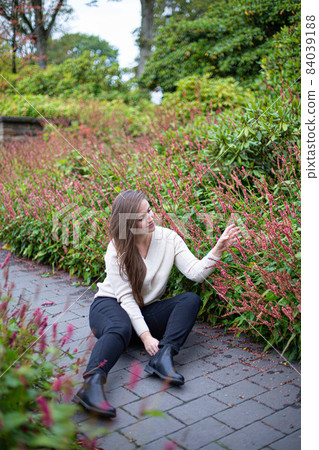 White young european woman in park 84039188