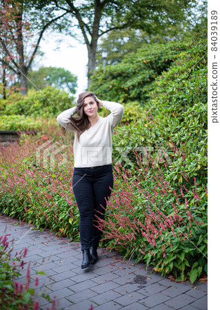 White young european woman in park 84039189