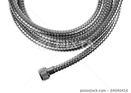 Shower hose on a white background. Silver shower hose close-up. Shower hose on a white background. Silver shower hose close-up. 84040458