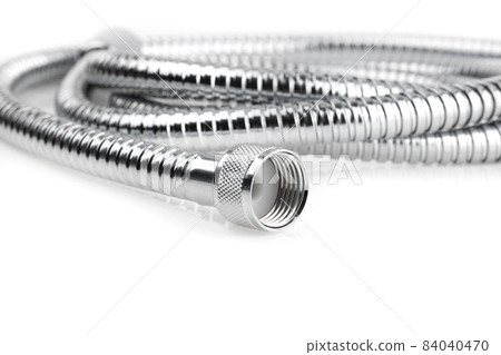 Shower hose on a white background. Silver shower hose close-up. 84040470
