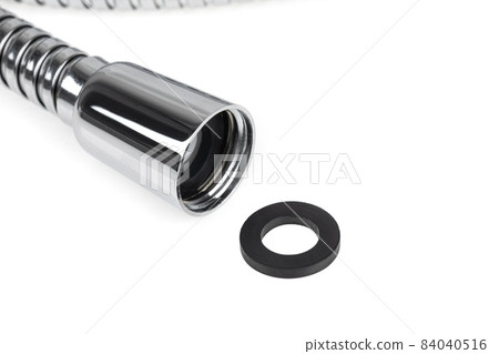 Shower hose on a white background. Silver shower hose close-up. 84040516