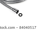 Shower hose on a white background. Silver shower hose close-up. 84040517
