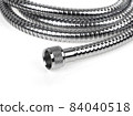 Shower hose on a white background. Silver shower hose close-up. 84040518