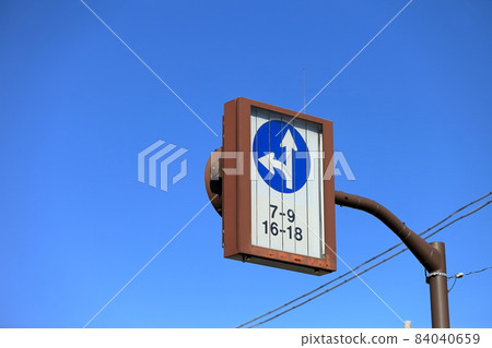 A sign that prohibits traveling outside the designated direction (no right turn) A sign that prohibits traveling outside the designated direction (no right turn) 84040659
