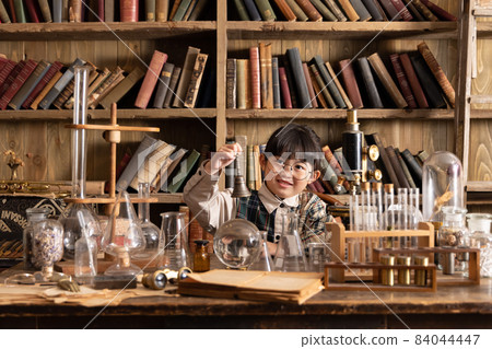 Girl studying and studying in an antique room 84044447