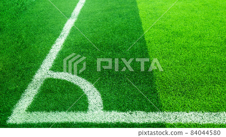 Green lawn floor, chess pattern The background is like in a football field. 84044580
