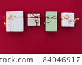 gift boxes on a red background 84046917