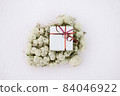 gift in a box in winter 84046922