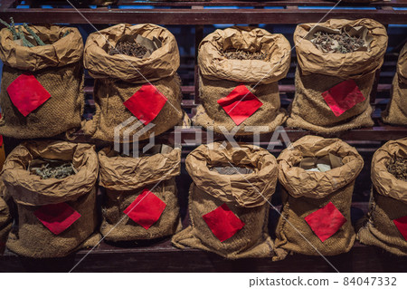 Cloth bags with herbs, copy space for herbal inscriptions 84047332