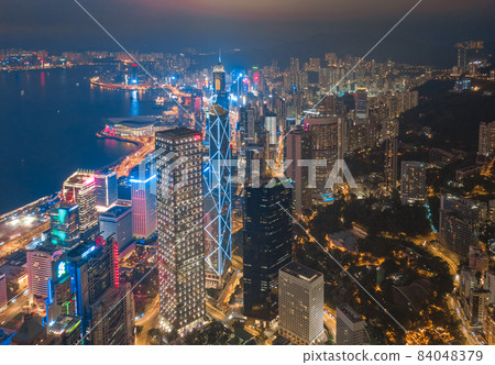 Aerial drone shot a Hong Kong Corporate Buildings streets. Aerial drone shot a Hong Kong Corporate Buildings streets. 84048379