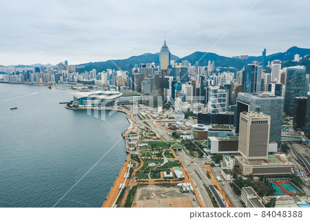 Aerial drone shot a Hong Kong Corporate Buildings streets. Aerial drone shot a Hong Kong Corporate Buildings streets. 84048388