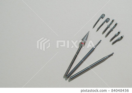 Glasses repair tools on white table. Glasses repair tools on white table. 84048436