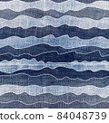 Wave texture on blue denim. Creative jeans seamless pattern. Indigo backdrop. Striped navy wallpaper. 84048739