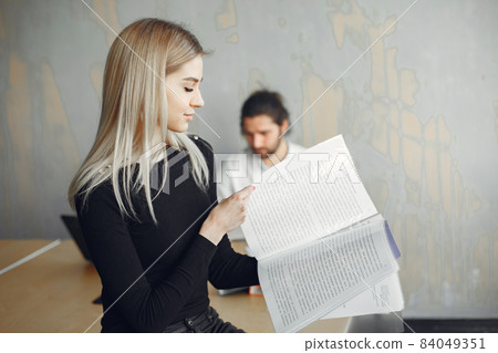 Stylish businessman with woman working at the office 84049351