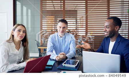 Foreign group participating in a video conference 84049549