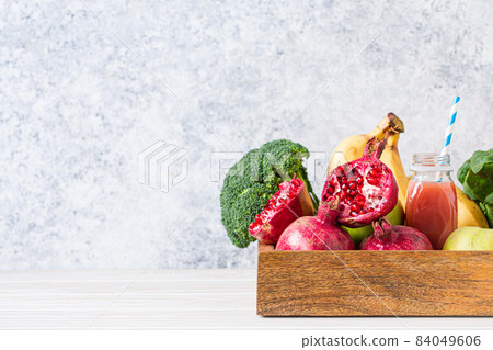 Healthy diet food and smoothie in wooden tray 84049606
