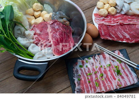 Cooking food in hot pot for make sukiyaki or shabu 84049781