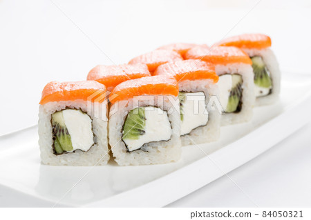 Japanese food, tasty of meal for lunch. Seafood. Philadelphia roll, salmon, soft cheese and kiwi 84050321