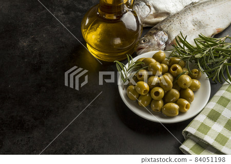 fish olive oil olives dark surface. High quality beautiful photo concept 84051198
