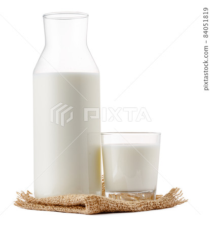 Glass bottle and cup of fresh milk isolated 84051819