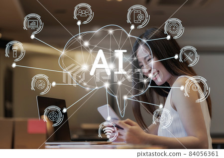 Polygonal brain shape of an artificial intelligence with AI text and various icon of smart city Internet of Things Technology over Asian businesswomen happiness celebrating when doing online shopping Polygonal brain shape of an artificial intelligence with AI text and various icon of smart city Internet of Things Technology over Asian businesswomen happiness celebrating when doing online shopping 84056361