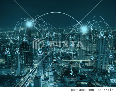 Computer Network connection line between building with location pin over Scene of Panorama of Bangkok cityscape which have Modern building at night time, Connectivity and global networks concept 84056512