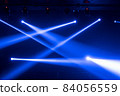 Abstract blurred photo of spotlight on the stage in conference hall or nightclub, silhouette audience or customer in restaurant,seminar and party environment,happy new year and merry christmas concept 84056559