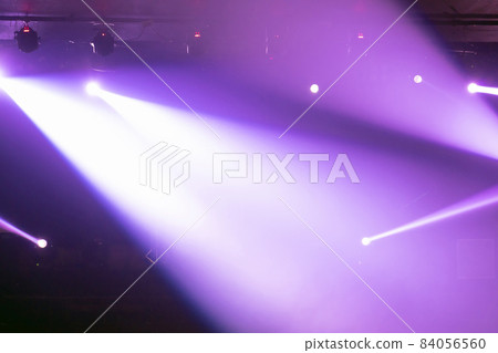 Abstract blurred photo of spotlight on the stage in conference hall or nightclub, silhouette audience or customer in restaurant,seminar and party environment,happy new year and merry christmas concept 84056560