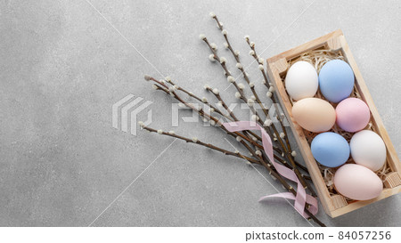 flat lay box with colorful easter eggs copy space. High quality beautiful photo concept flat lay box with colorful easter eggs copy space. High quality beautiful photo concept 84057256