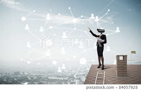 Concept of security and privacy protection with camera headed woman 84057928