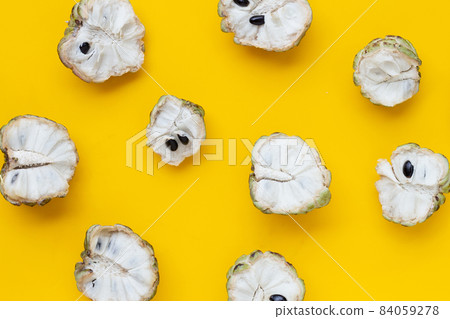Custard apple on yellow background. Custard apple on yellow background. 84059278