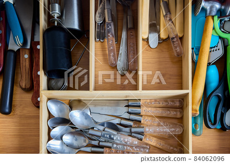 Cutlery tray in drawer of kitchen table, with division into compartments. Cutlery tray in drawer of kitchen table, with division into compartments. 84062096