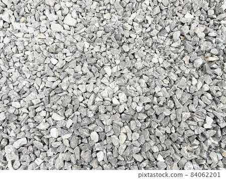 Image material of many small light gray crushed stones laid on the ground 84062201
