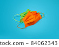 Protective colourful face masks on bright  background. 84062343