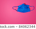 Protective colourful face mask on bright  background. 84062344