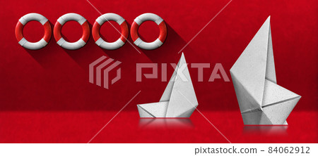 White Paper Boats that are Sinking on Red Background with Lifebuoys 84062912