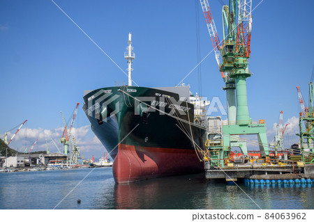 Container ship moored at the container terminal Container ship moored at the container terminal 84063962