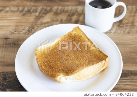 Delicious thick sliced toast and coffee morning Delicious thick sliced toast and coffee morning 84064238