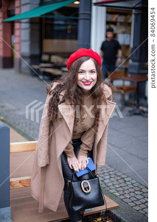 Romantic pretty woman in the street Romantic pretty woman in the street 84069454