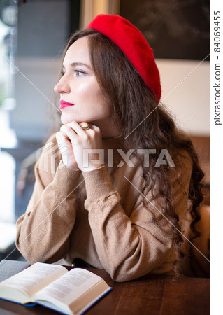 Romantic pretty woman in the cafe Romantic pretty woman in the cafe 84069455