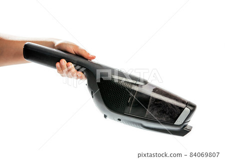 Hand vacuum cleaner isolated on the white background, suction collects dust and small particles from floors and other surfaces 84069807