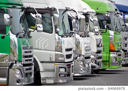 Logistics image Trucks lined up in parking 84069978