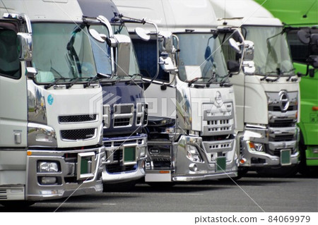 Logistics image Trucks lined up in parking Logistics image Trucks lined up in parking 84069979