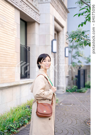 Smiling female outdoor Smiling female outdoor 84075096