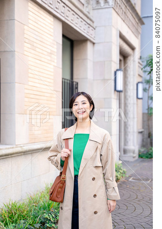 Smiling female outdoor Smiling female outdoor 84075097