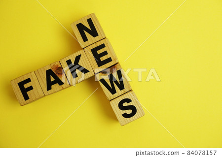 Fake News word alphabet letters on wooden background; Fake News word alphabet letters on wooden background; 84078157
