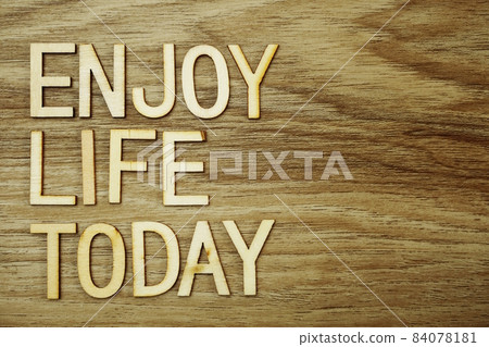 Enjoy Life Today text message on wooden background Enjoy Life Today text message on wooden background 84078181